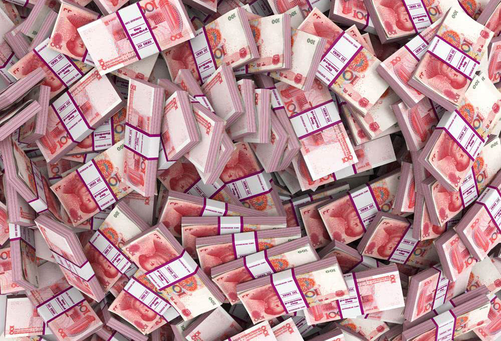 一叠叠的百元钞票堆成山